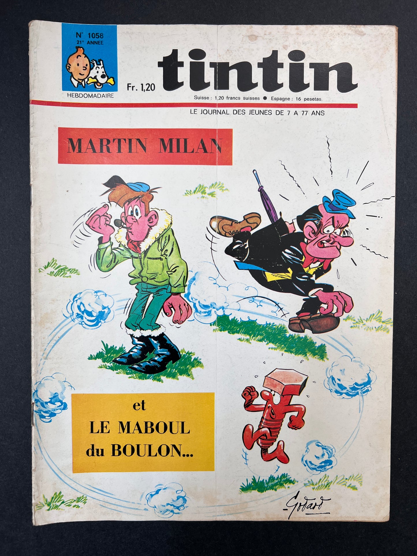 Vintage Tintin comic book cover with colorful illustrations and text