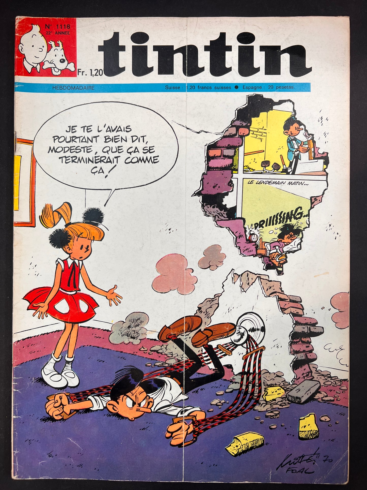 Comic book cover featuring two characters with a text bubble and a white background.