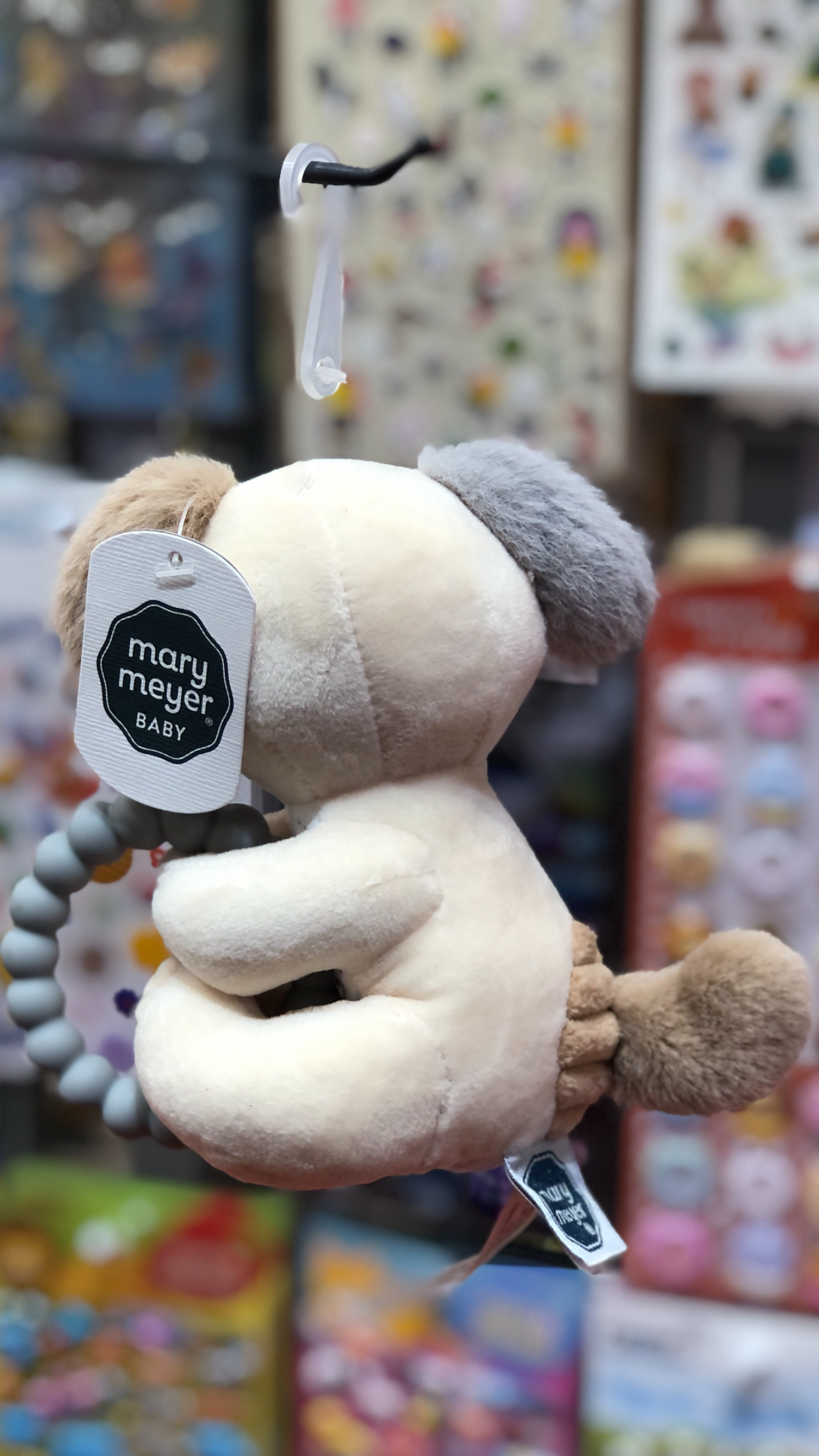 Mary Meyer Baby Sparky Puppy teether rattle toy, soft plush in neutral colors with silicone teether and internal rattle