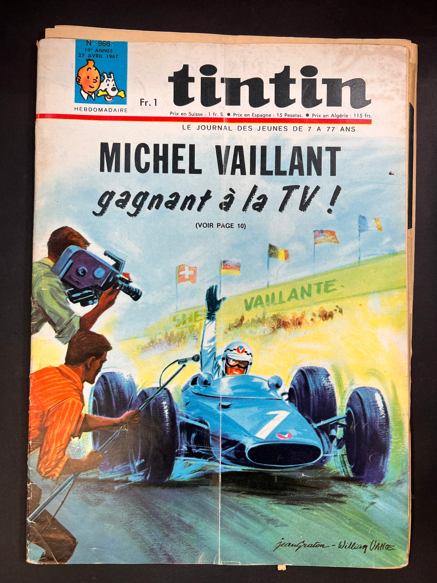 Vintage Tintin magazine cover featuring Michel Vaillant racing comic, promoting TV adaptation, April 1967 issue in worn condition