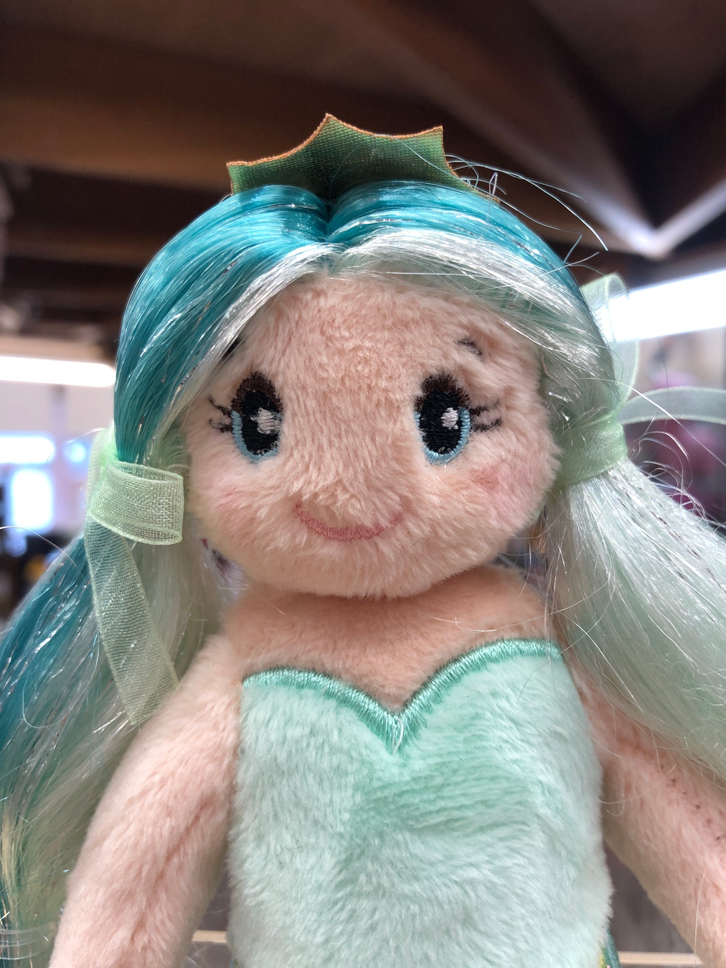Douglas Princess Mermaid plush toy with teal hair, crown, and embroidered features, perfect for hugging and imaginative play