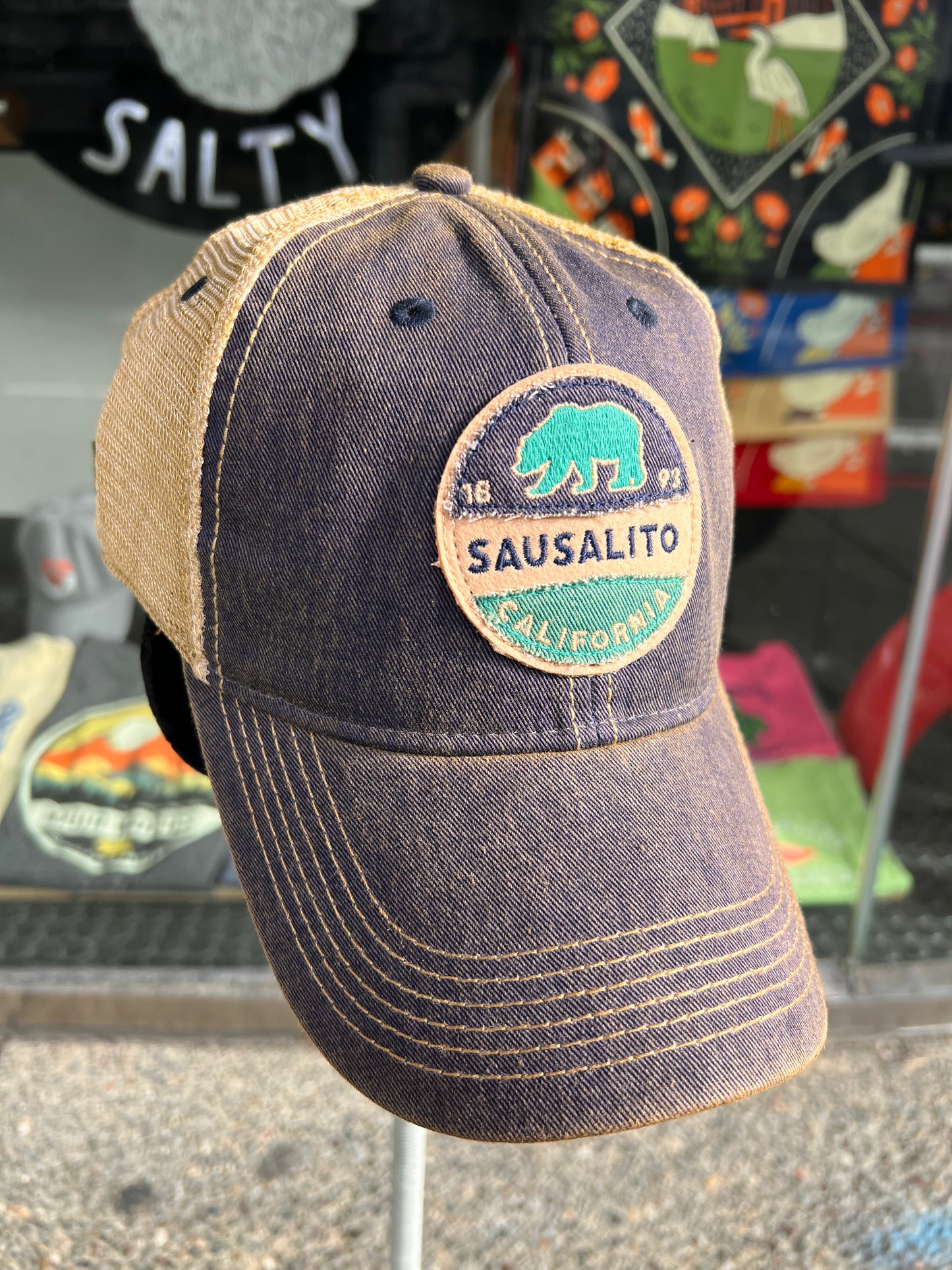 Sausalito trucker cap with embroidered California grizzly bear patch, navy and tan mesh design, 1893 incorporation date