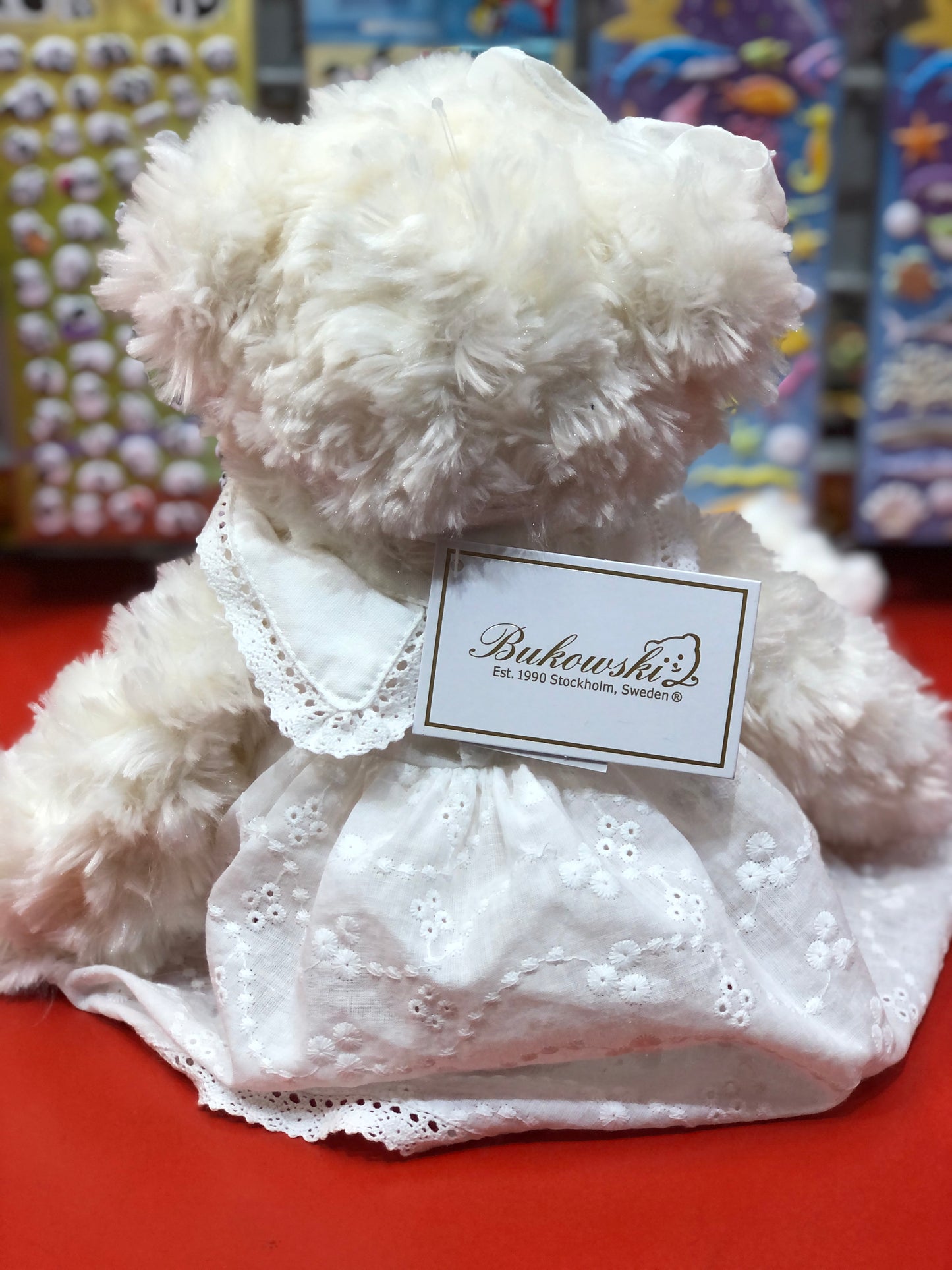 Bukowski Bears Nikole plush toy in white nightgown, curly fur, ready for bedtime cuddles