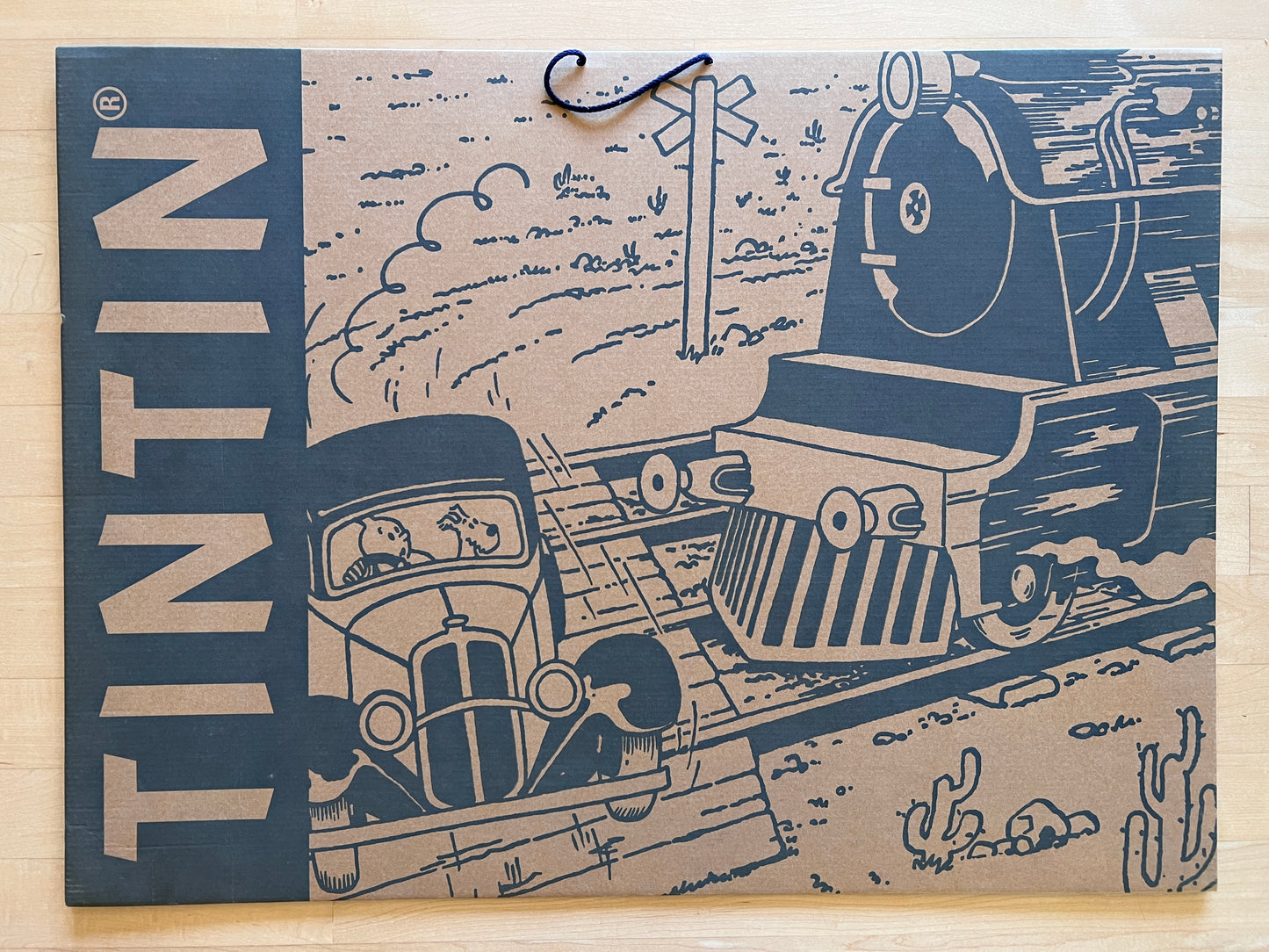 Tintin poster serigraph showing car and train scene from "L'Oreille Cassée" comic, 50x70cm limited edition print in folio