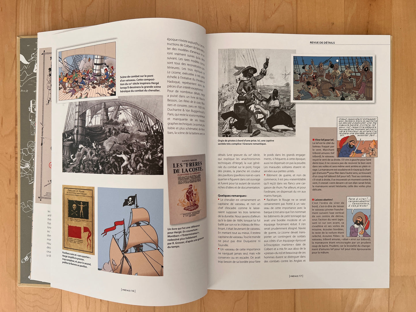 Open book showing Tintin archive pages with illustrations of ship battles, pirate scenes, and comic panels from "The Secret of the Unicorn"