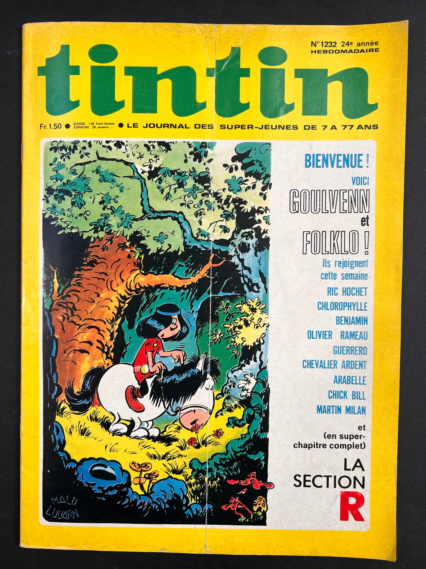 Vintage Tintin magazine cover, issue 1232, featuring colorful illustration of character on horseback in forest, with story previews