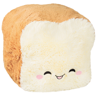 Cute plush loaf of bread toy with smiling face, soft yellow-brown exterior and white interior