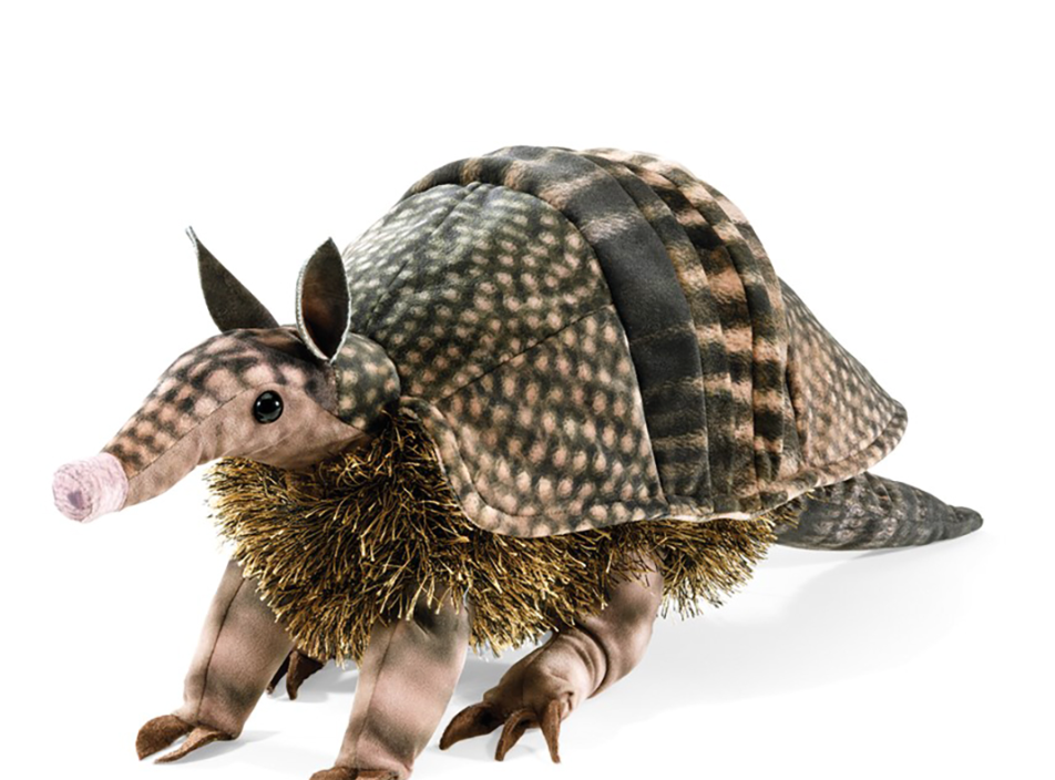 Realistic Folkmanis armadillo puppet with textured shell, hairy belly, and movable legs and head, 17 inches long