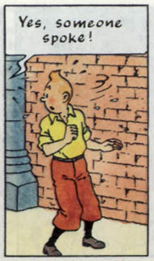Tintin comic panel: Cartoon character in yellow shirt and red pants against brick wall, with speech bubble saying "Yes, someone spoke!"
