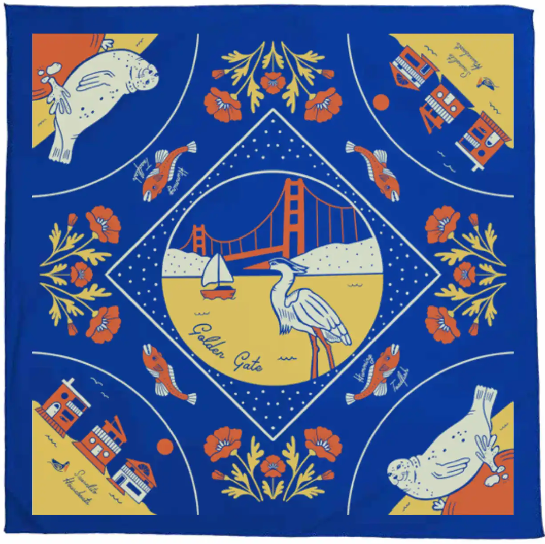 Sausalito cotton bandana featuring Golden Gate Bridge, heron, seals, houseboats, and poppies in vibrant blue, orange, and yellow design