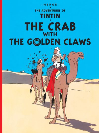 The front cover of the hardcover comic book "The Adventures of Tintin: The Crab with the Golden Claws" by Hergé. Set against a solid blue sky background, the illustration shows Tintin dressed in a white desert tunic and head covering, riding a large brown camel across a sunny desert landscape. Following closely behind him is a second camel, with rolling sand dunes stretching across the background.