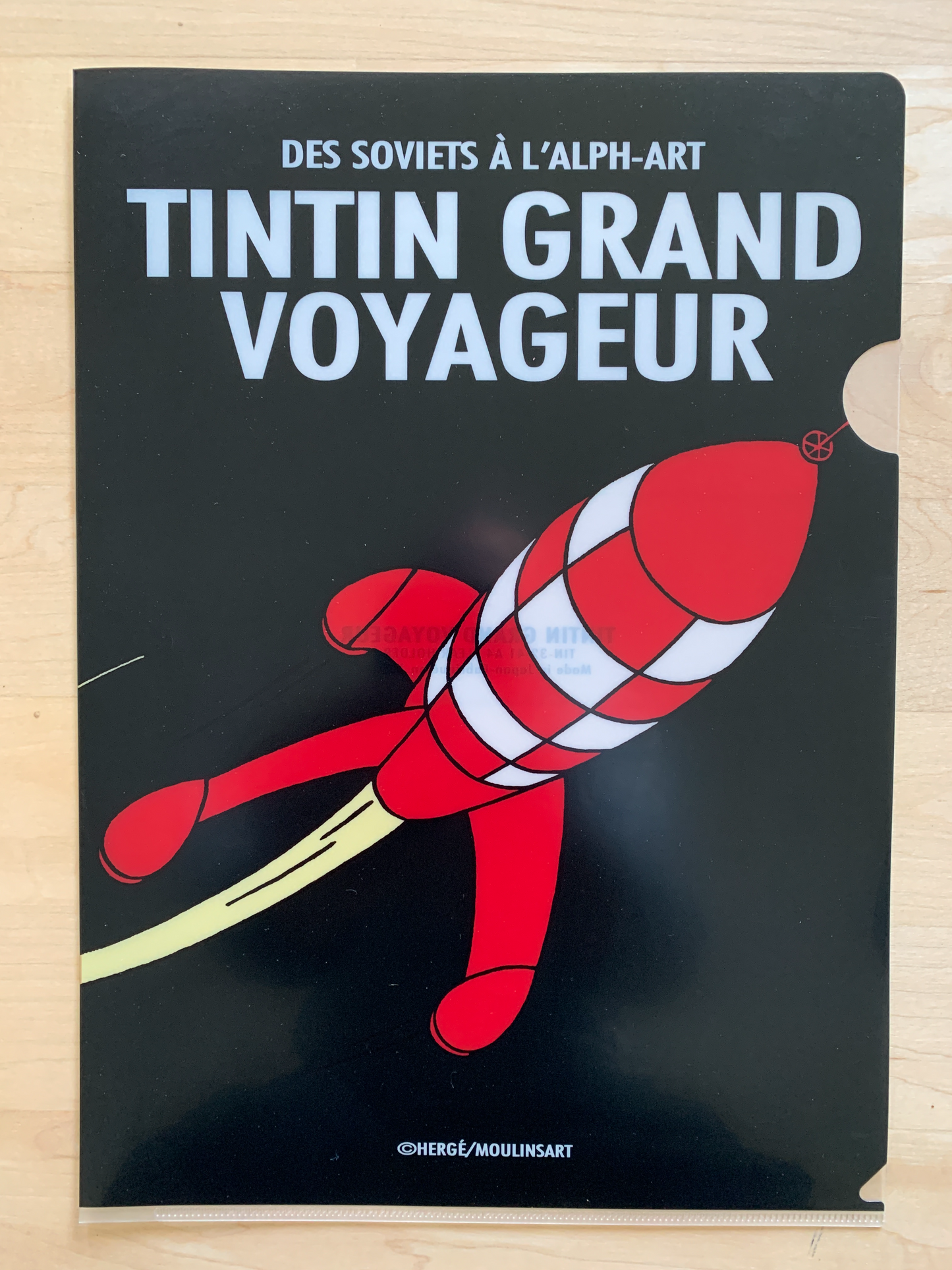Tintin moon rocket A4 file folder featuring iconic red and white spacecraft on black background, titled "Tintin Grand Voyageur"