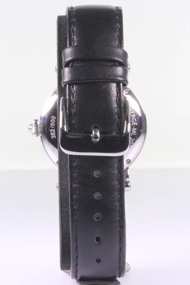 Limited edition Tintin self-winding watch with black leather strap, stainless steel case, and visible mechanism through clear back