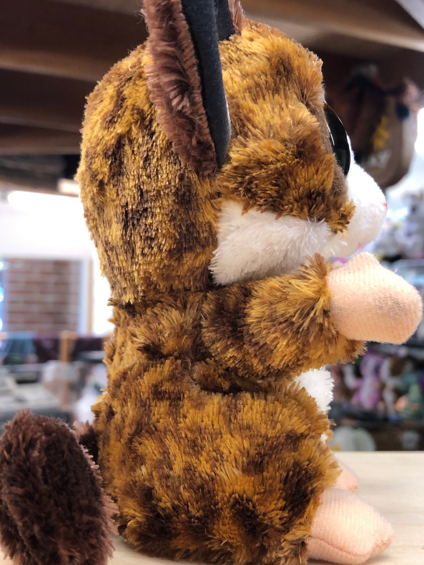 Ty Beanie Boo Binky brown bush baby plush toy with large eyes and ears, soft fur, and tiny size for hiding and night vision