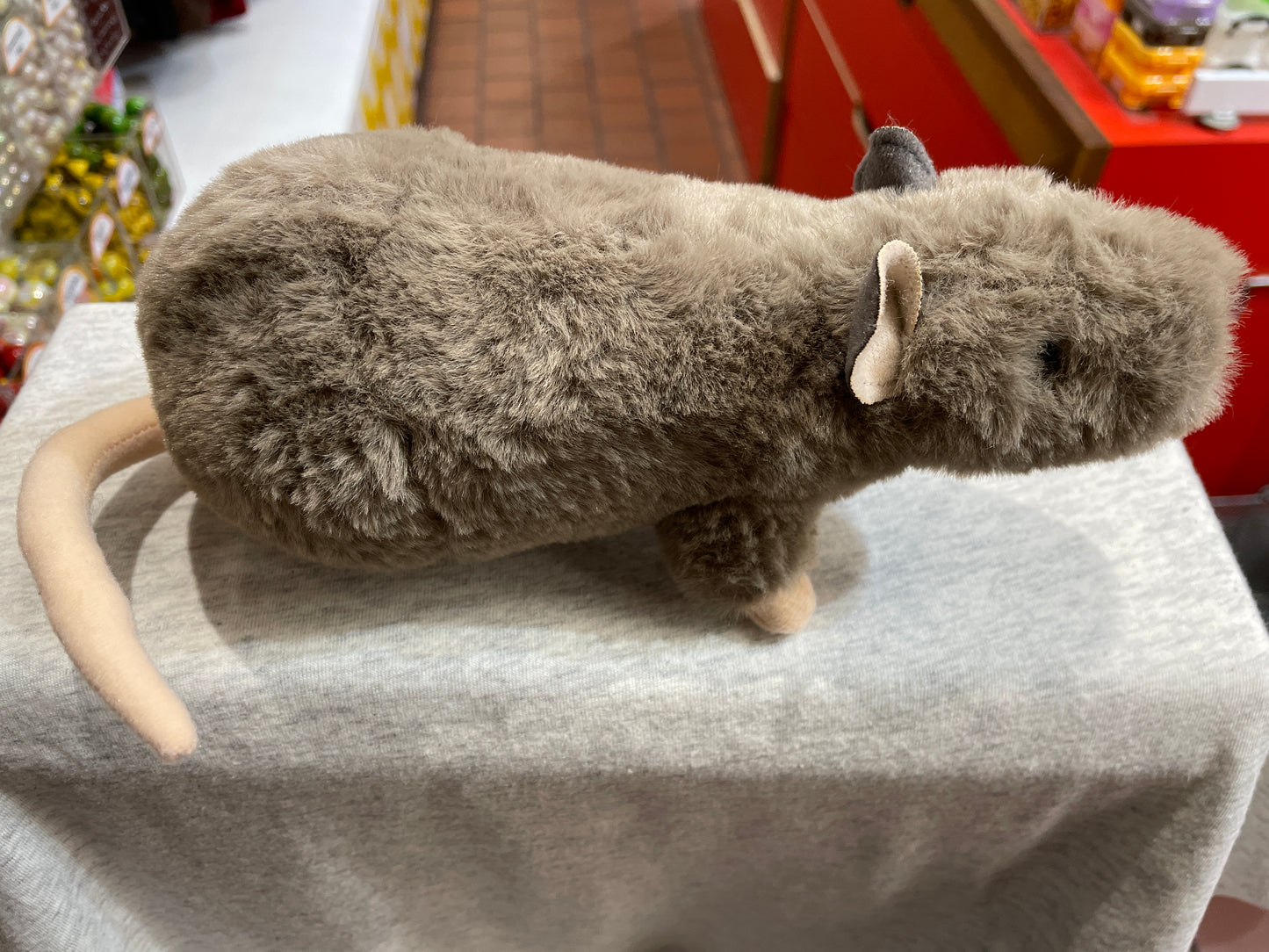 Lifelike 9-inch Douglas Ralph black rat plush toy with soft fur, pink ears and tail, perfect for rat enthusiasts and cuddling