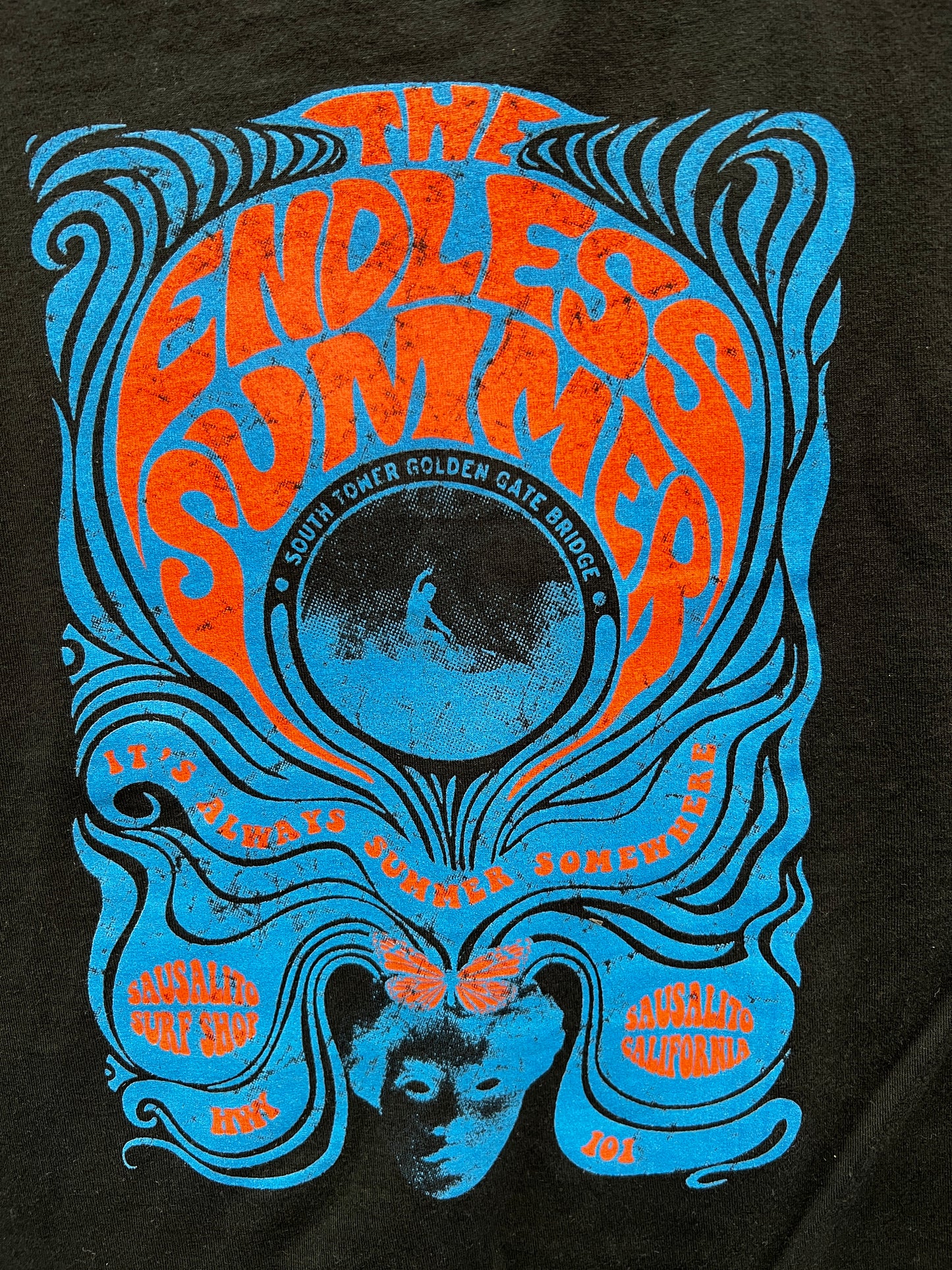 Retro 1960s Sausalito Endless Summer surf t-shirt design with psychedelic waves and Golden Gate Bridge surfer graphic