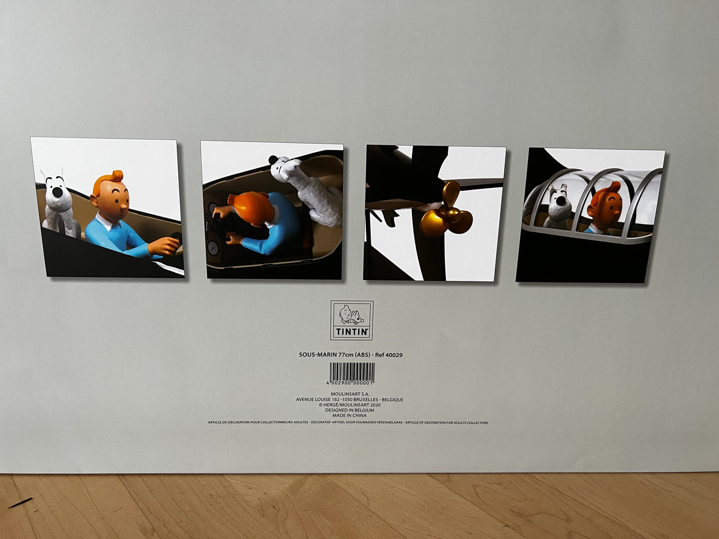 Tintin Shark Submarine model images showing characters inside, propeller, and exterior details from Red Rackham's Treasure adventure