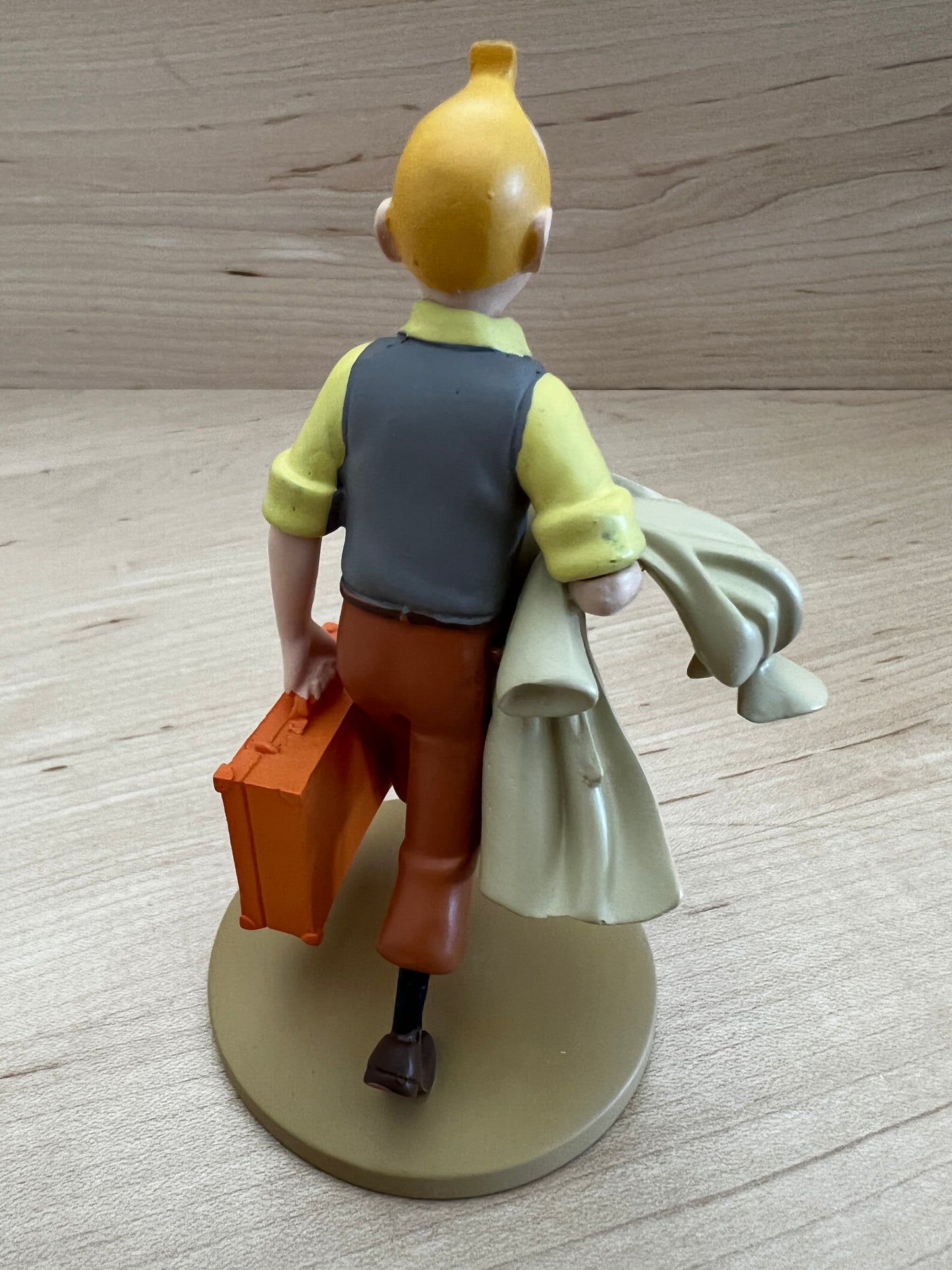 Tintin resin figure, hand-painted, walking with suitcase and coat, 12cm tall, from Moulinsart Brussels