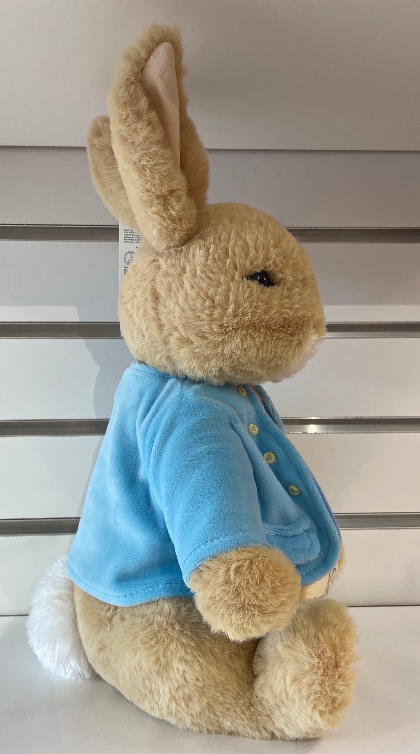 Soft plush Peter Rabbit toy with iconic blue coat, large ears, and detailed features from Beatrix Potter's classic story