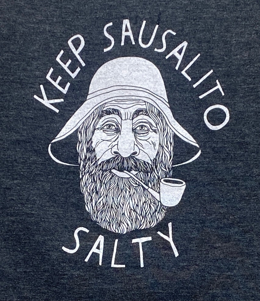 Black t-shirt with "Keep Sausalito Salty" slogan and illustration of bearded sailor smoking pipe, promoting local charm