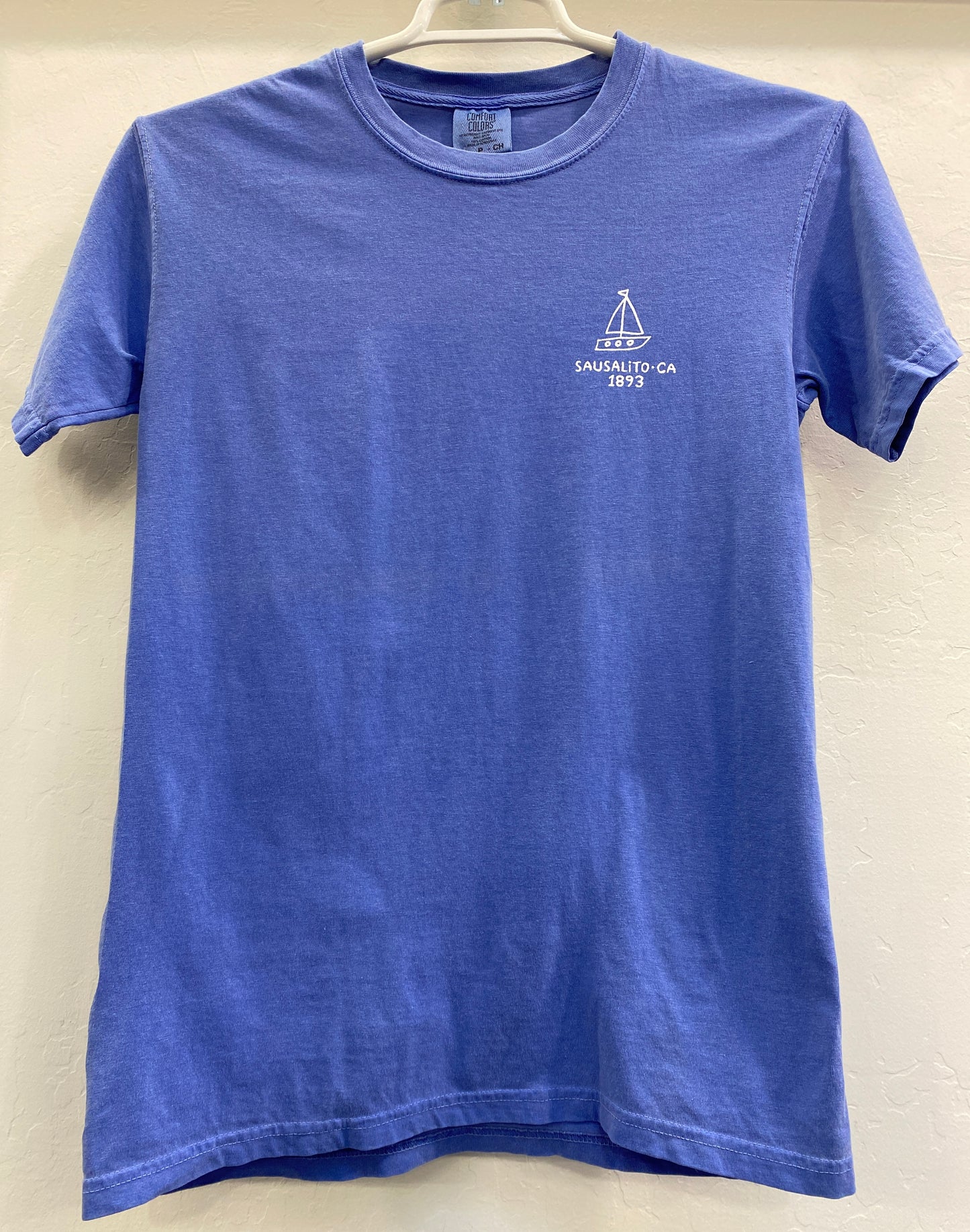 Blue Sausalito Latitude 38 t-shirt with sailboat logo and "Sausalito CA 1893" text, showcasing coastal town's maritime heritage
