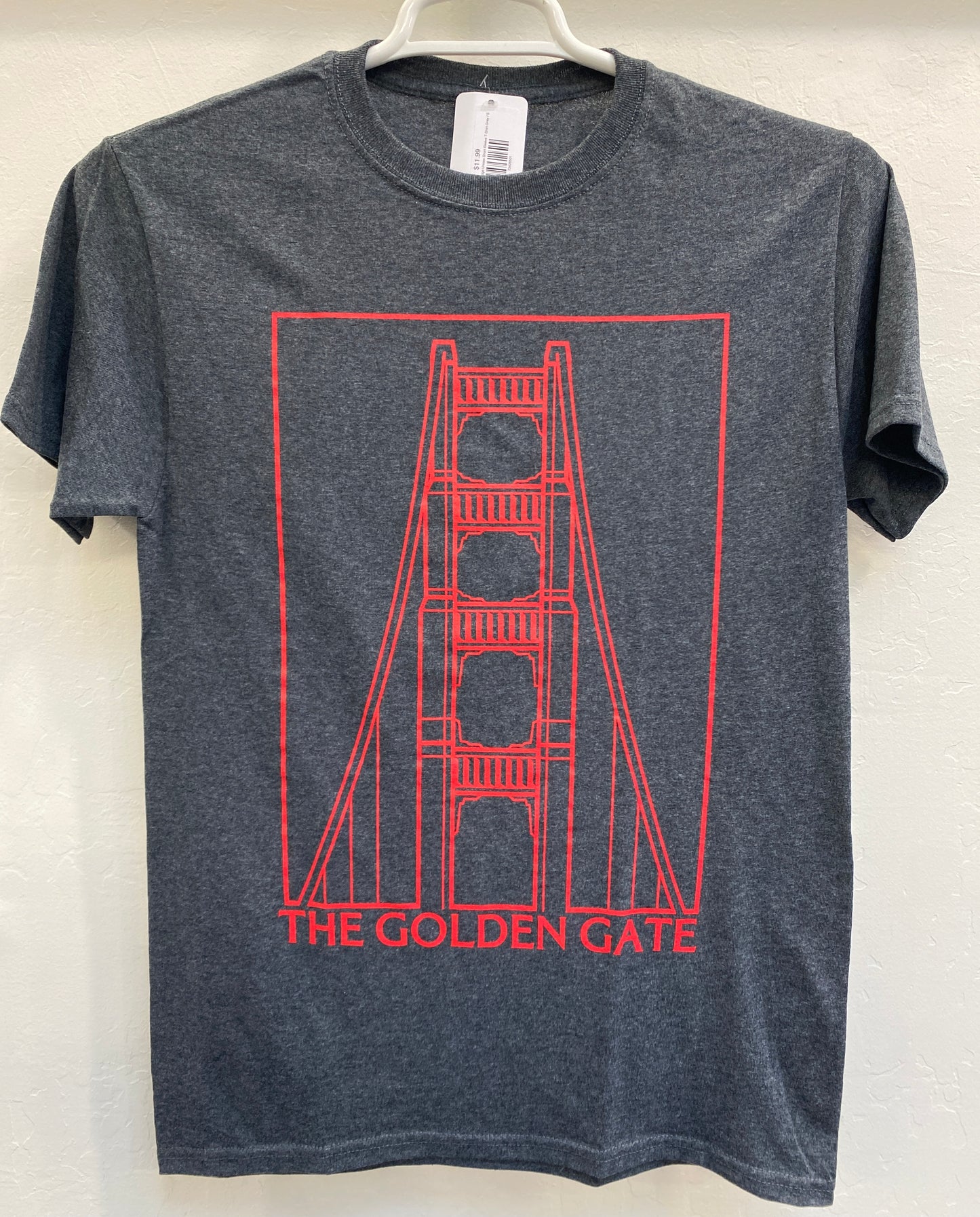 Gray unisex t-shirt with red line drawing of Golden Gate Bridge tower and text "THE GOLDEN GATE"
