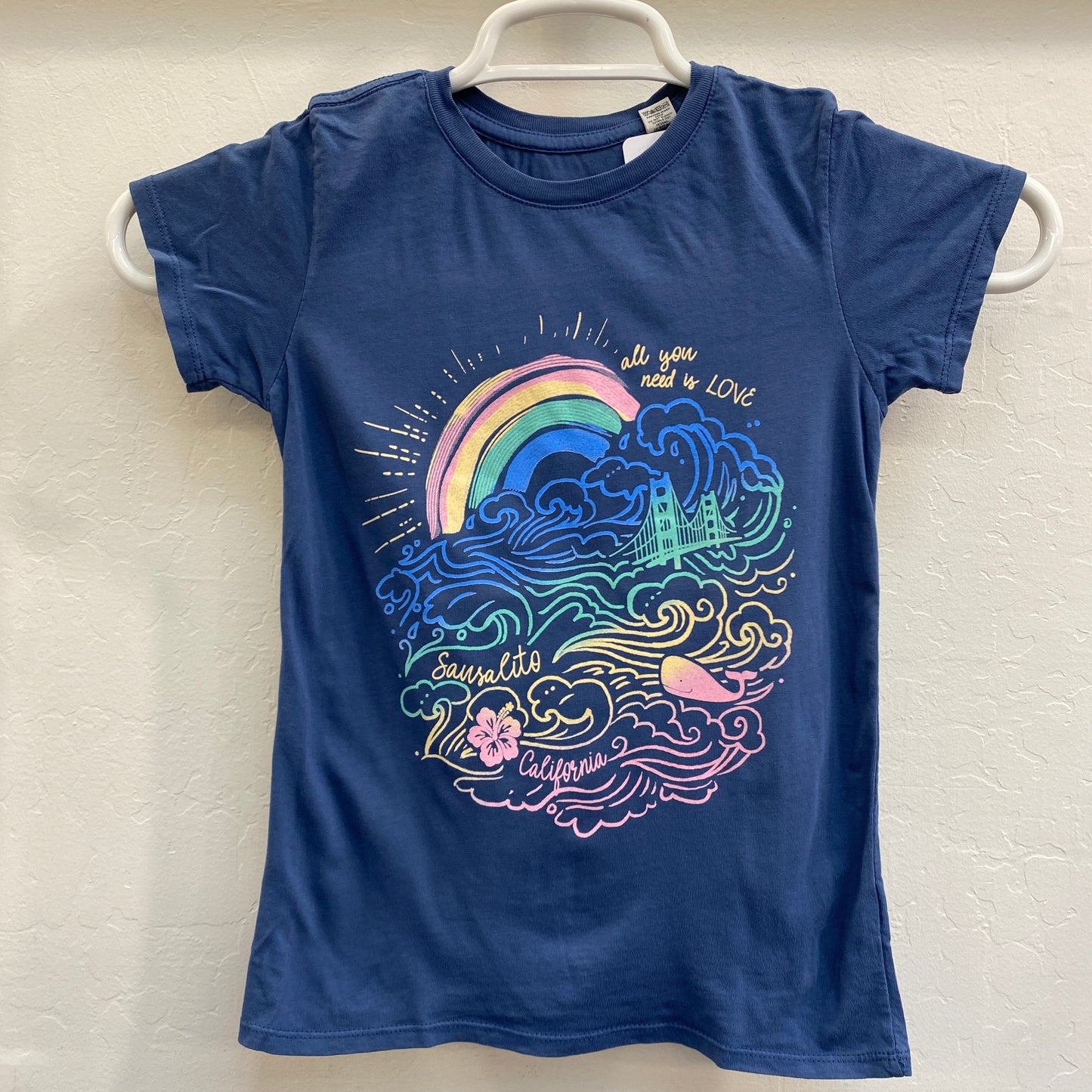 Sausalito kids' t-shirt with colorful Golden Gate Bridge, rainbow, waves, and whale design, featuring "All you need is love" text