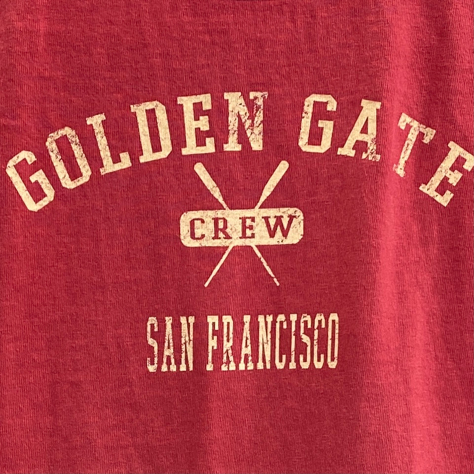 Red kids' t-shirt with "Golden Gate Crew San Francisco" and crossed oars logo in yellow print