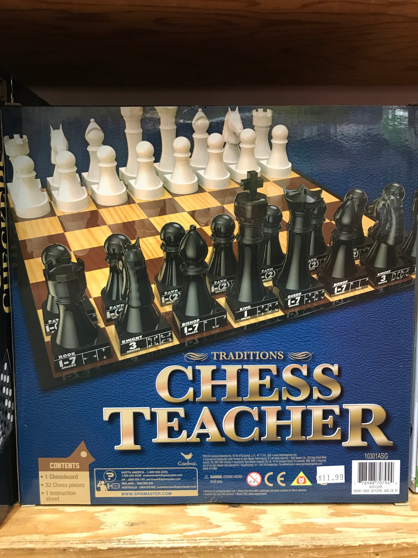 Traditions Chess Teacher set with labeled pieces showing movement, large board, and instructional packaging for learning chess