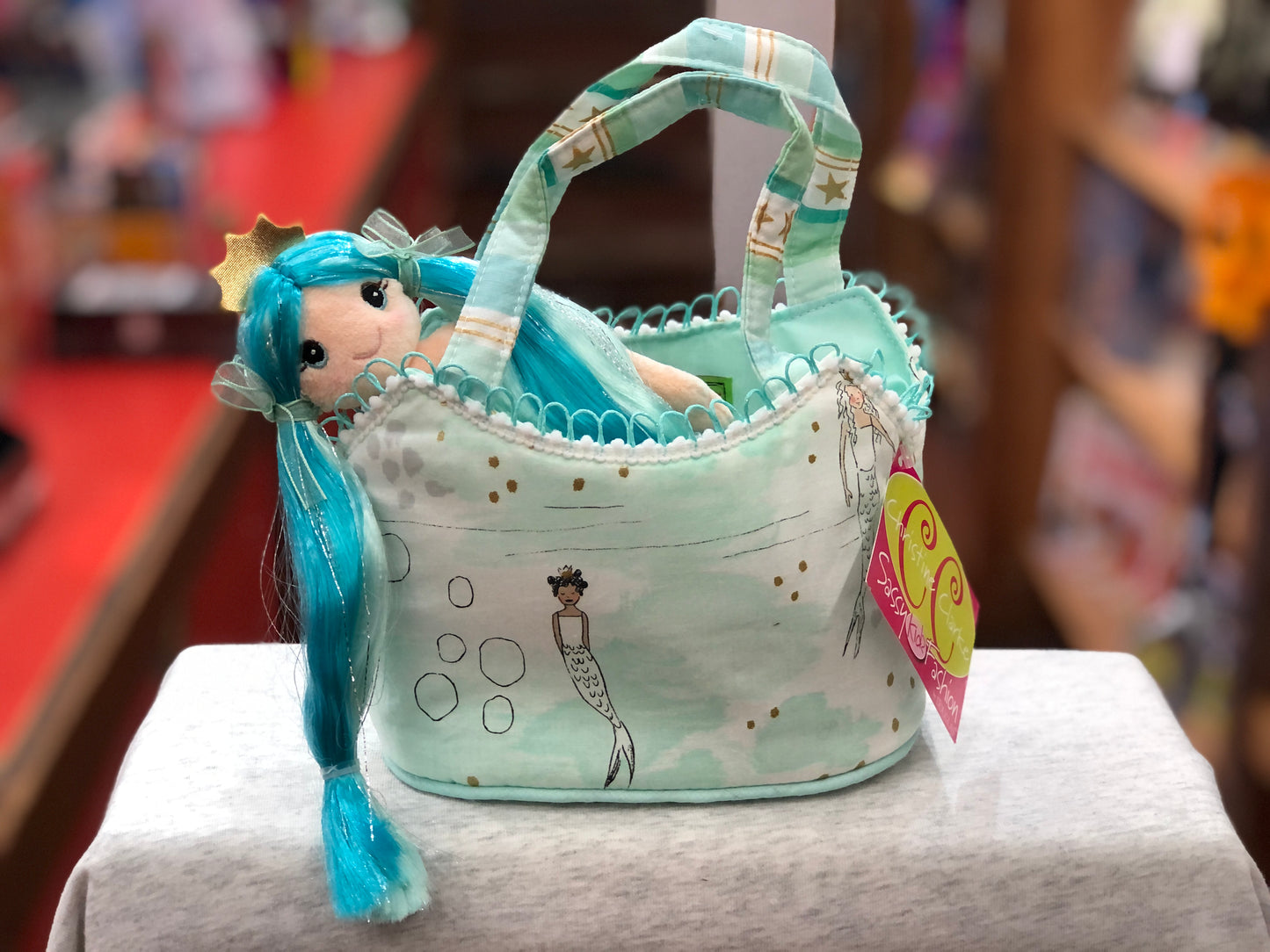 Princess Mermaid Sassy Pet Sak purse with aqua plush doll, seafoam design, golden accents, and scallop trim for children's play