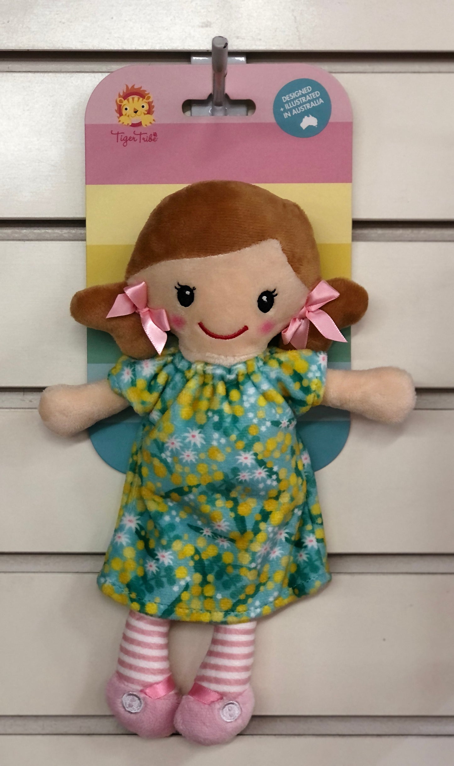 Mini rag doll Nellie in floral dress with pink bows, designed in Australia, perfect for cuddling and nursery display