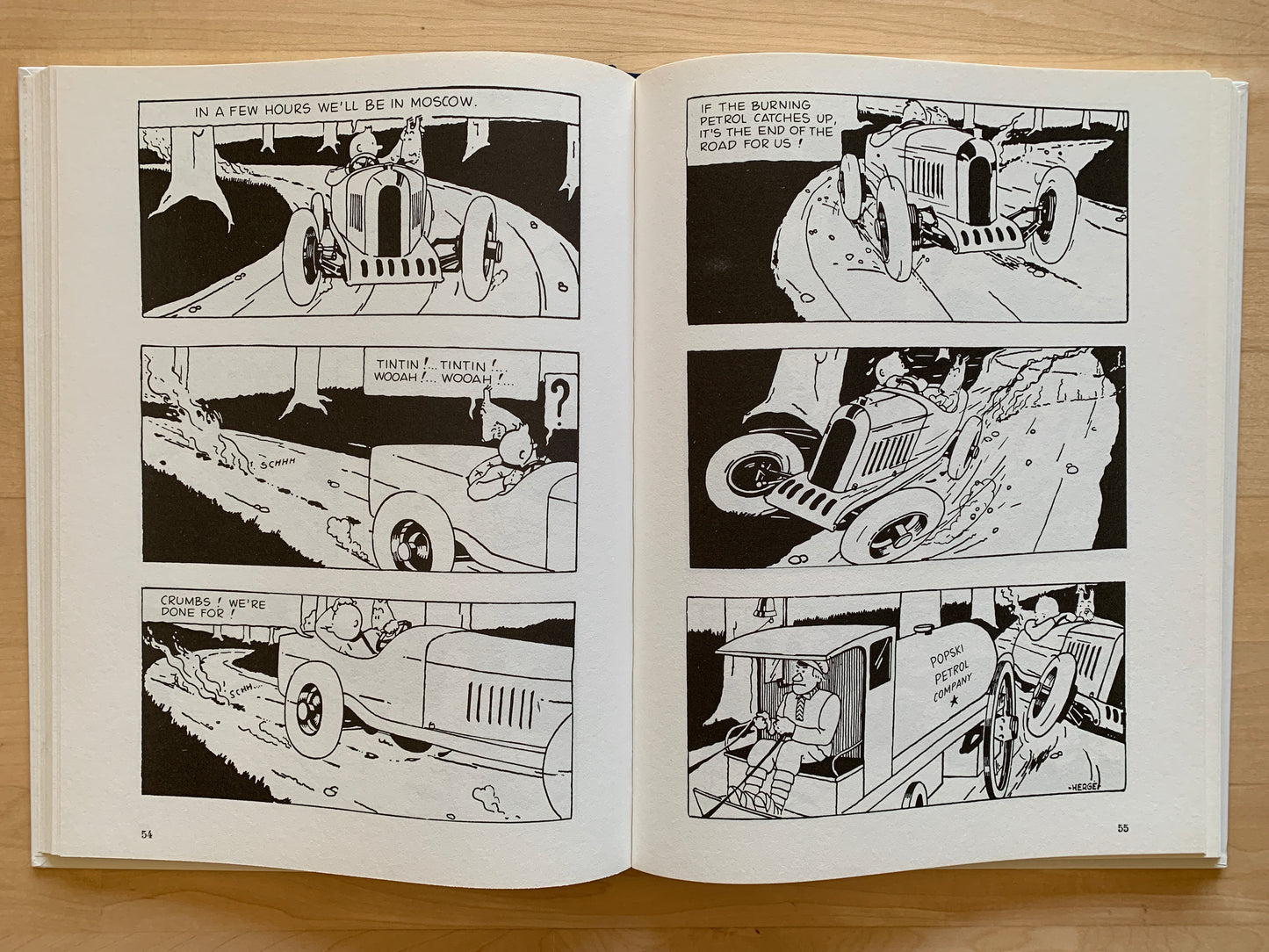 Comic panels from Tintin in the Land of the Soviets, showing car chase and perilous journey to Moscow in vintage automobile