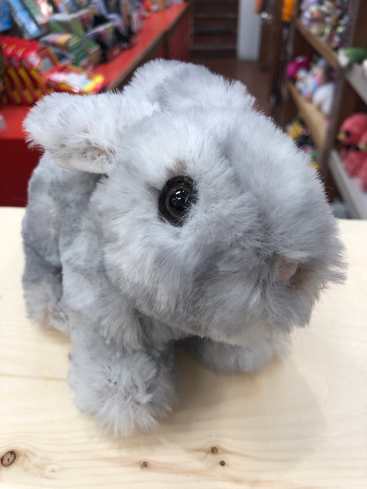 Adorable gray bunny plush toy with soft fur and big eyes, perfect springtime companion for cuddling