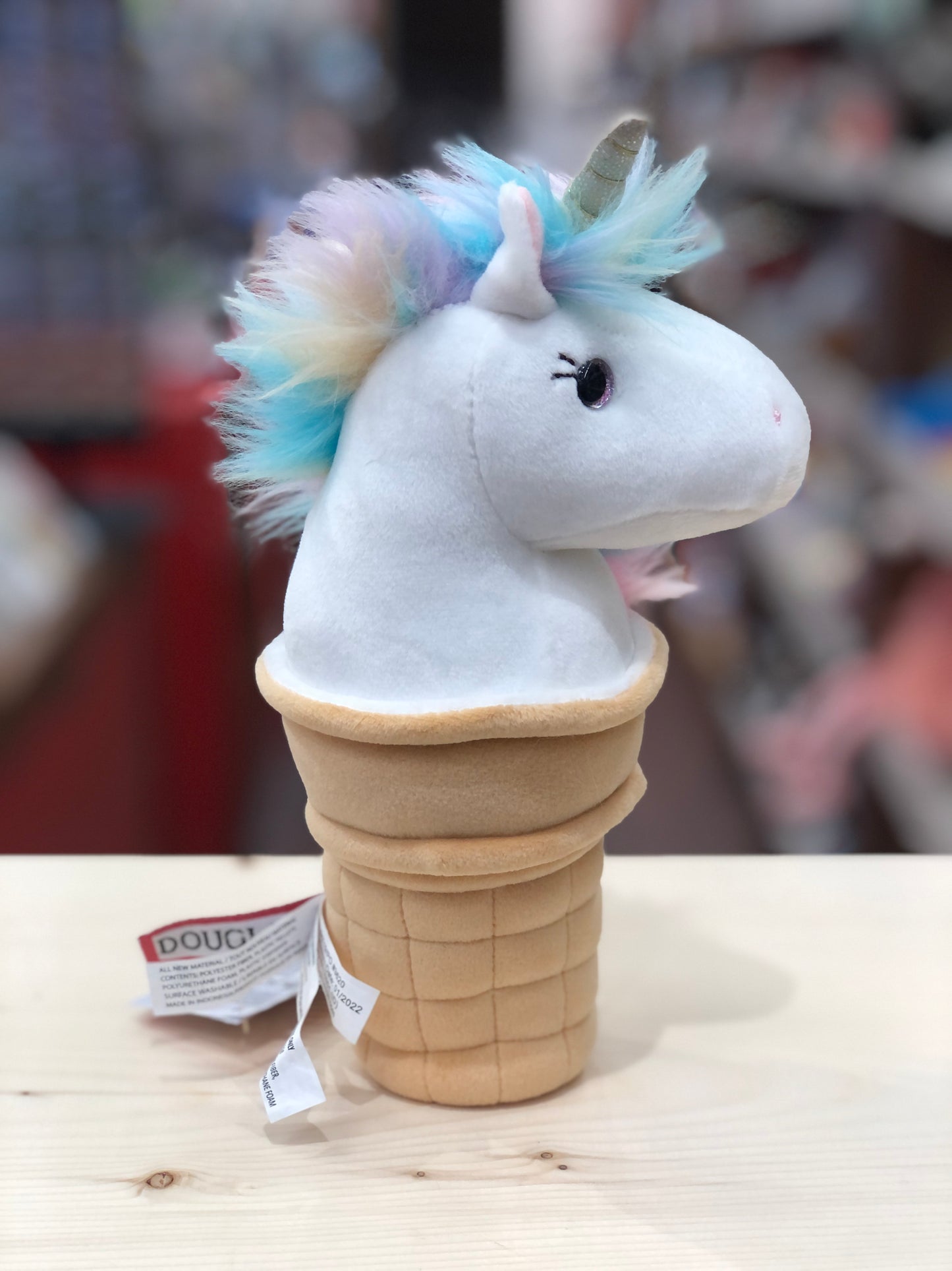 Plush unicorn ice cream cone toy with rainbow mane, golden horn, and pink eyes in soft microfiber, perfect summer treat