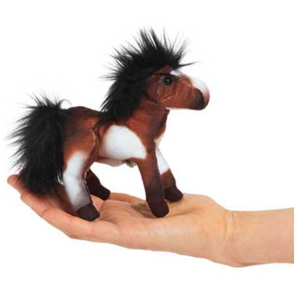 Soft brown and white mini horse finger puppet with black mane, standing on an open hand
