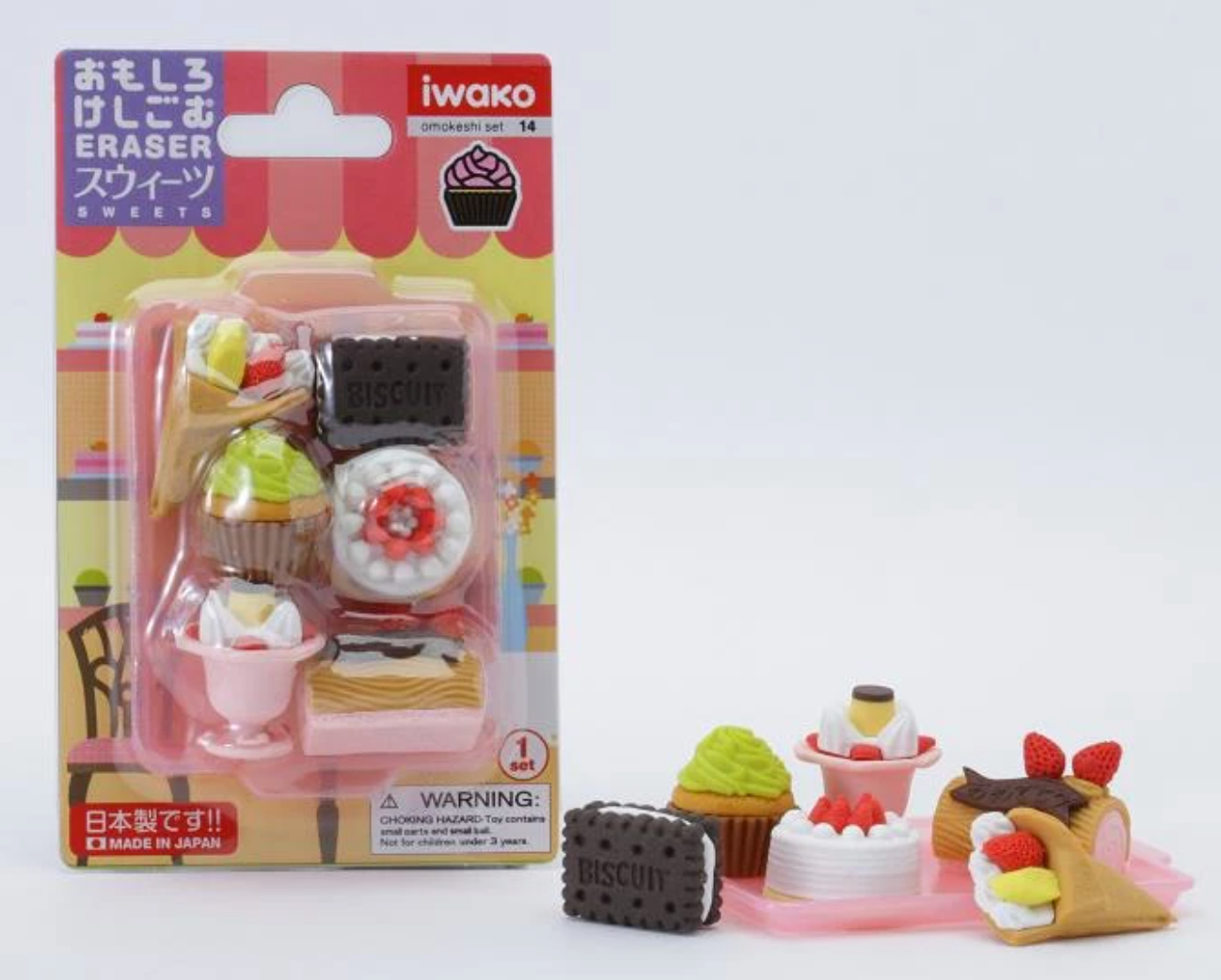Japanese dessert eraser set featuring 6 miniature cake and ice cream shaped erasers, packaged and displayed on pink surface