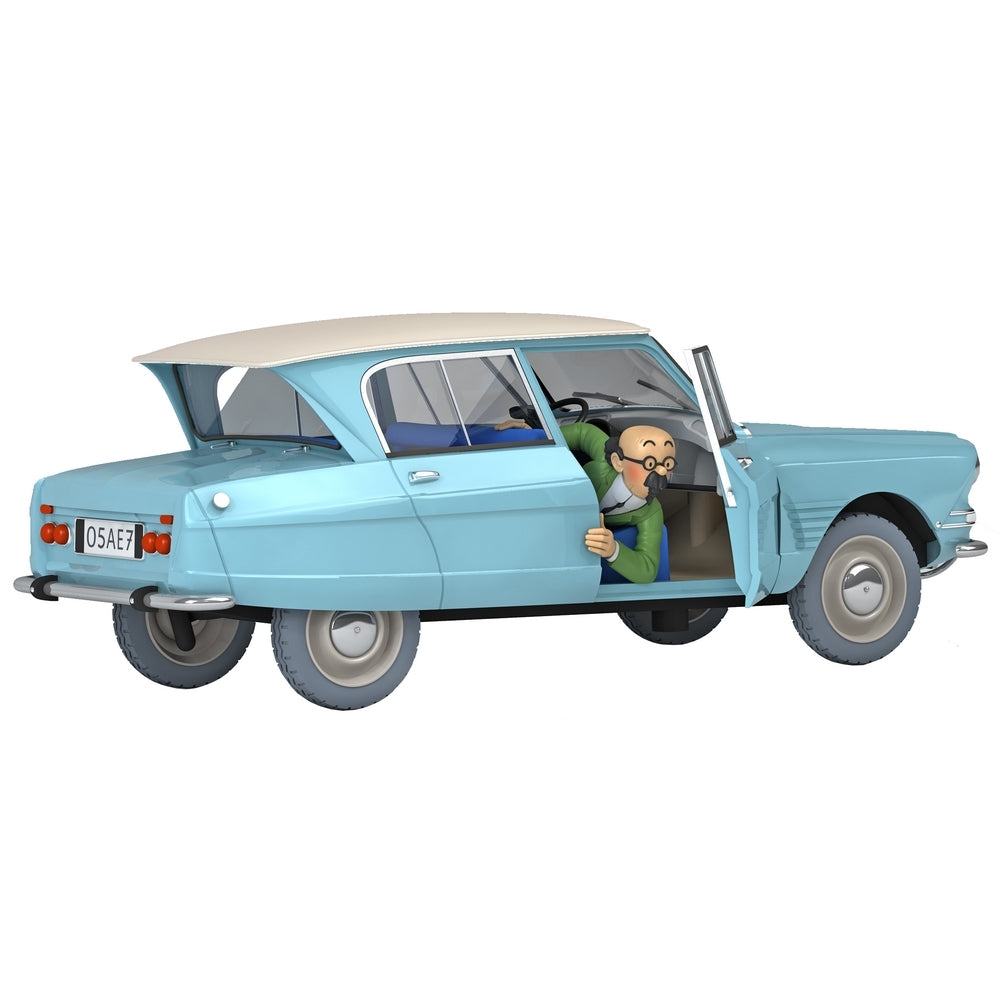 Tintin 1/24 scale Citroën Ami 6 model with character peeking out of passenger door, light blue vintage car collectible