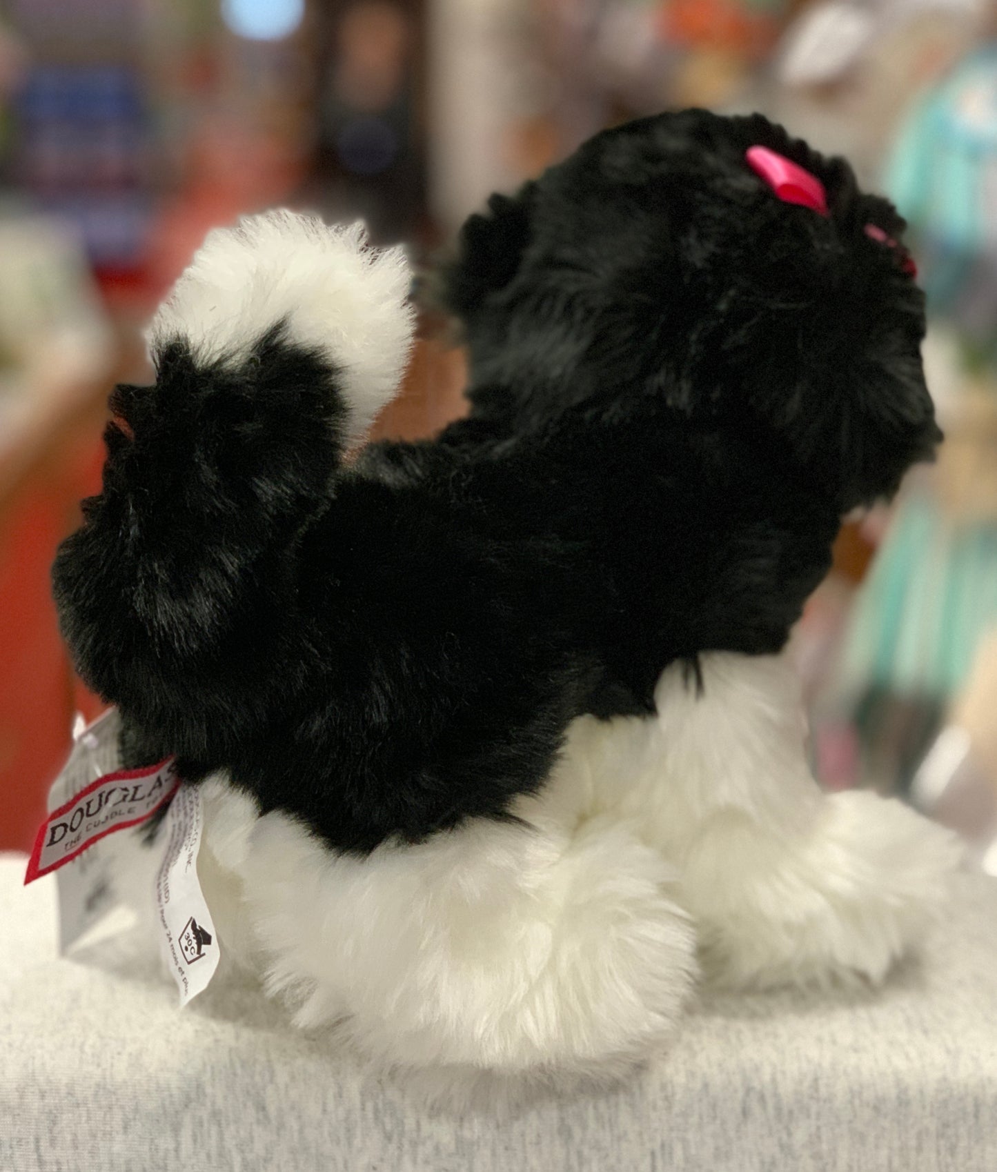 Adorable black and white Shih Tzu plush toy with pink bow, soft fluffy fur, and realistic markings, perfect for cuddling