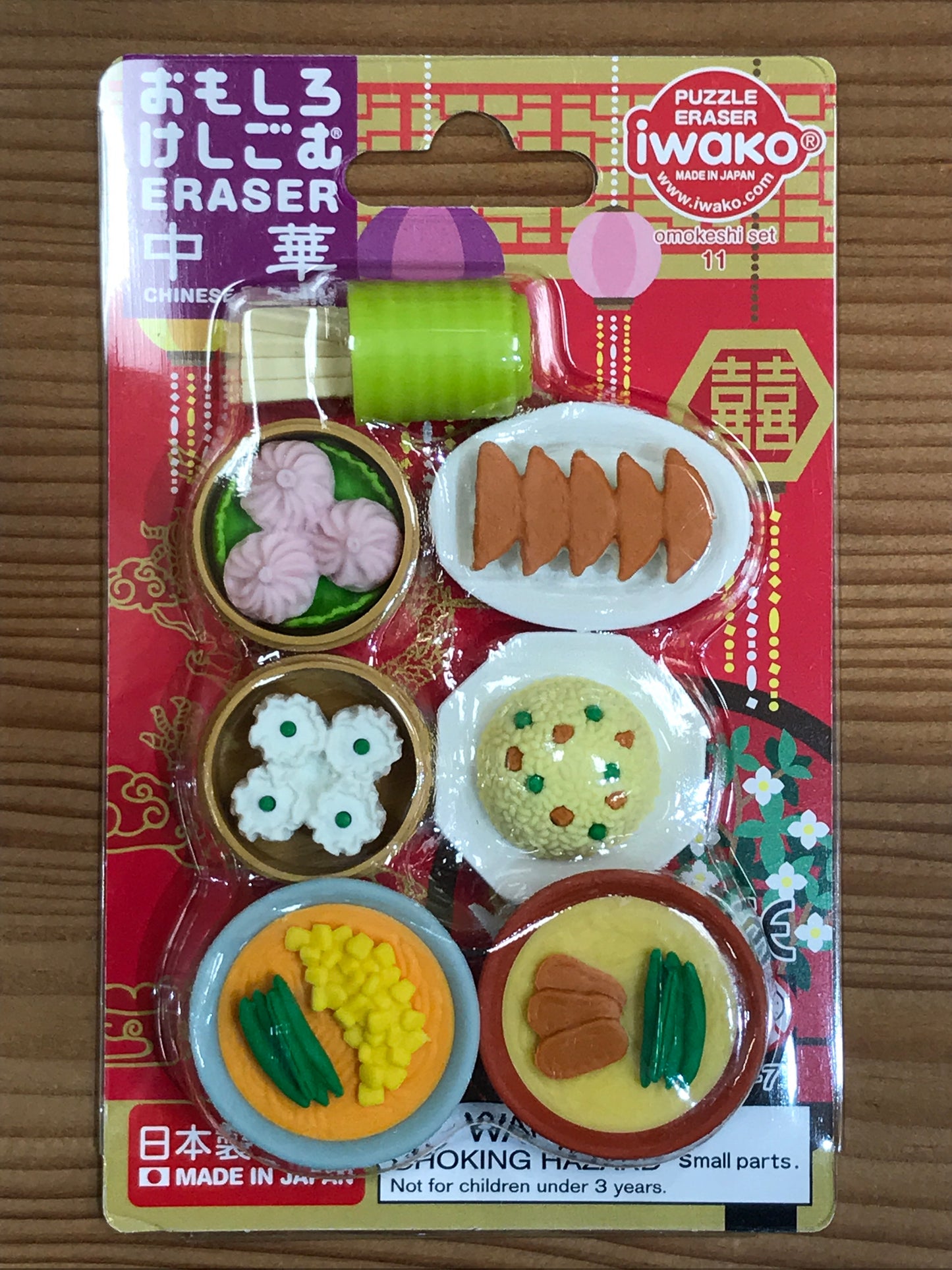 Japanese eraser set featuring 6 miniature dim sum dishes, including dumplings and rice balls, on colorful packaging