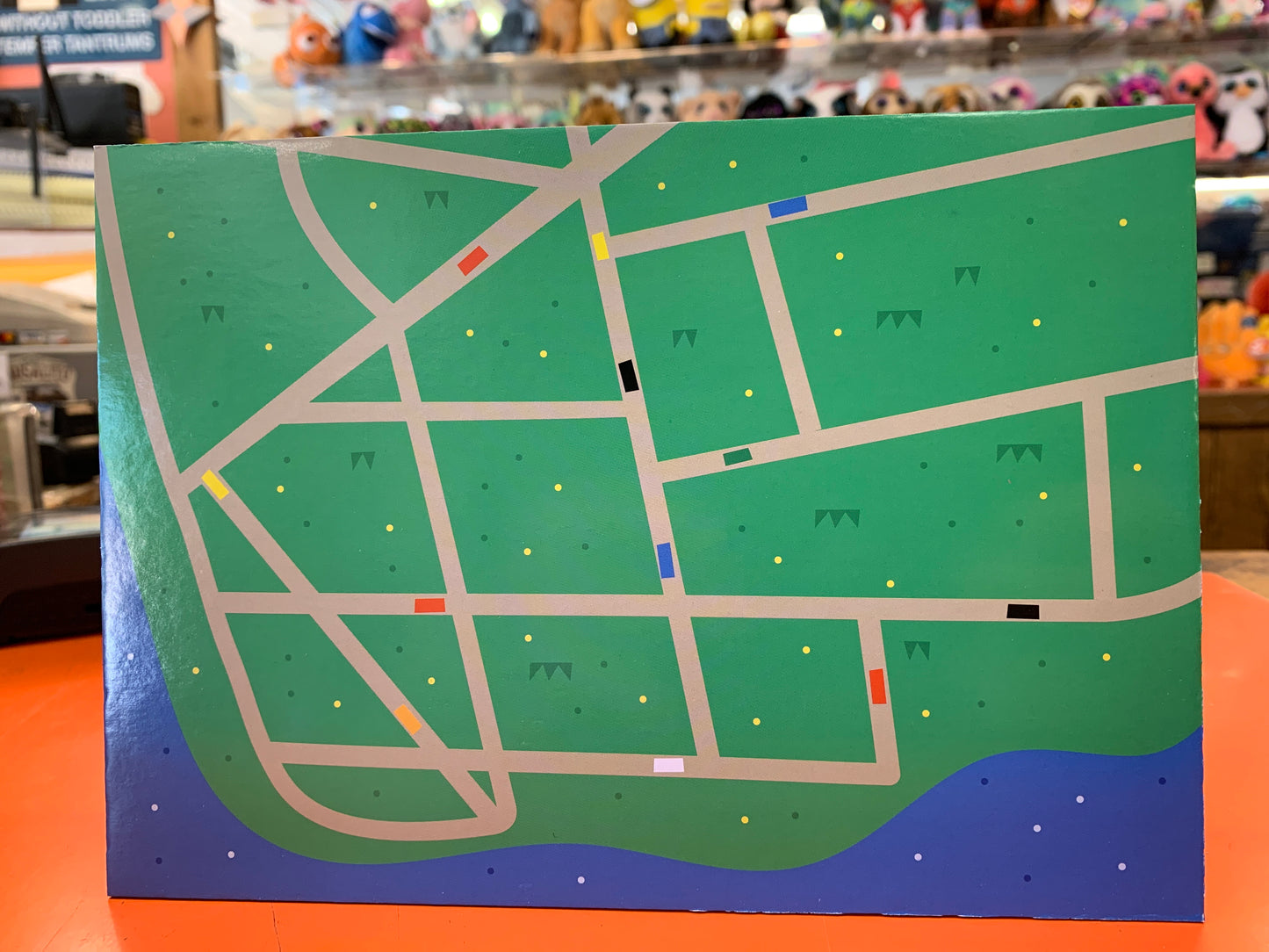 Stylized map of San Francisco diorama kit showing streets, landmarks, and bay area, displayed in toy store