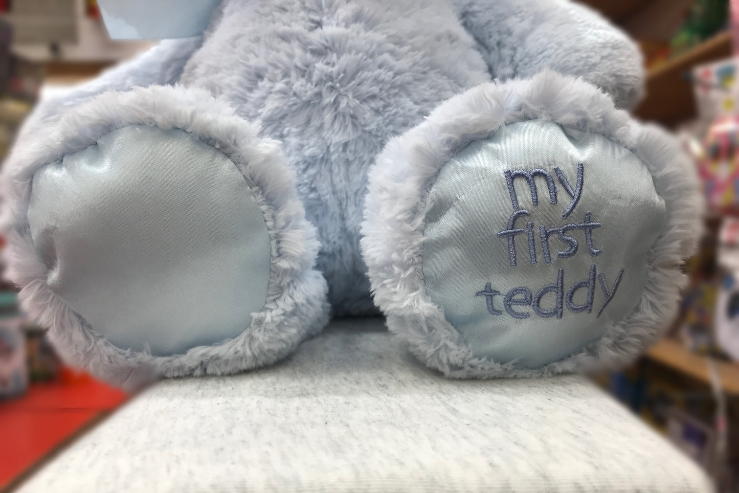 Soft blue Gund teddy bear feet with "My First Teddy" embroidered, perfect for babies