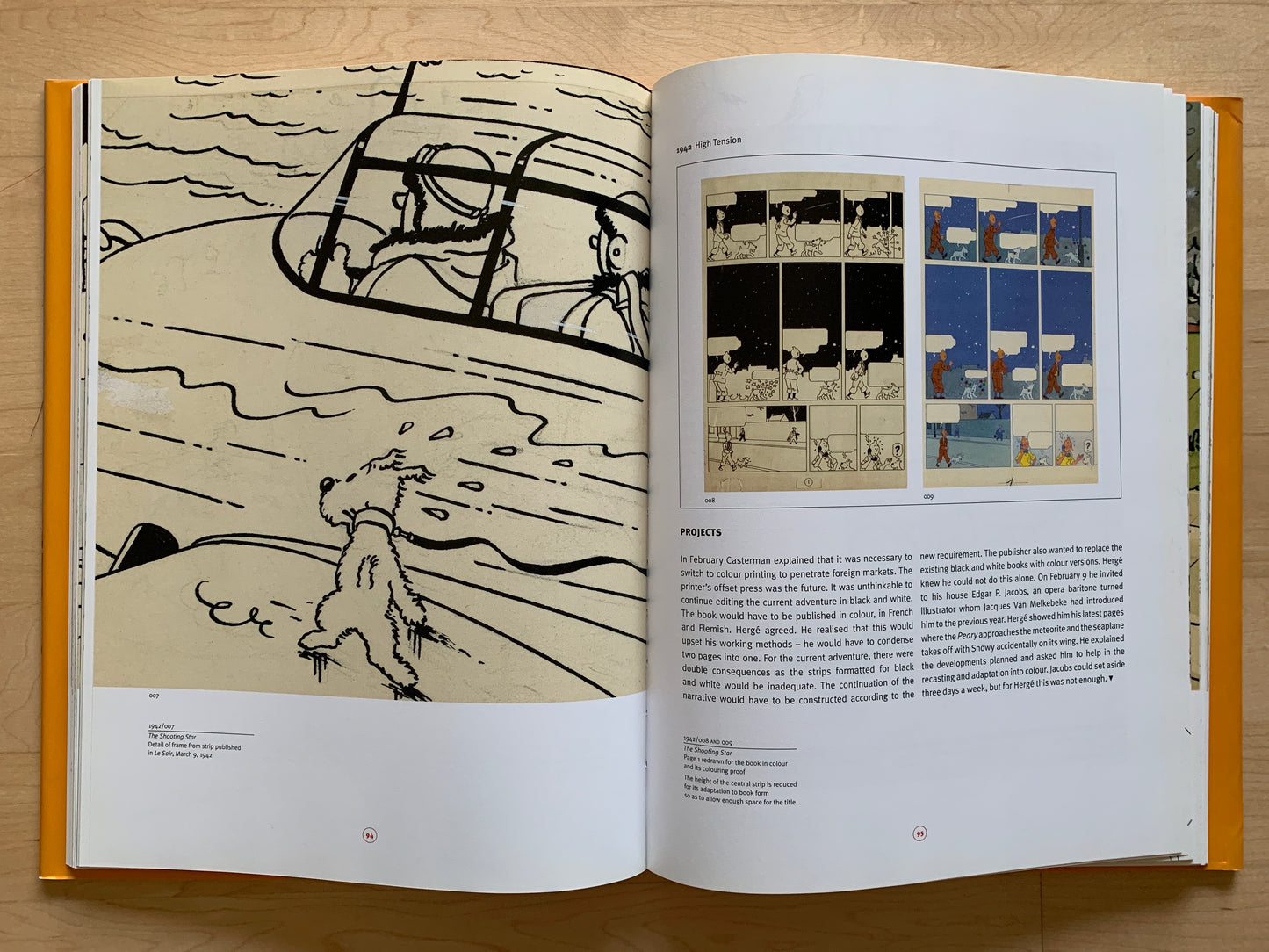 Open book showing Tintin comic illustrations and storyboards, highlighting Hergé's artistic process and evolution of his iconic characters