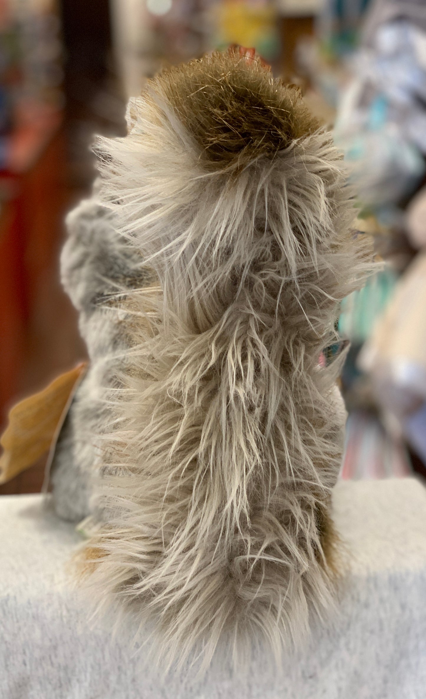Folkmanis Gray Squirrel puppet with detailed plush fur, movable mouth, and whiskers, showcasing realistic wildlife design