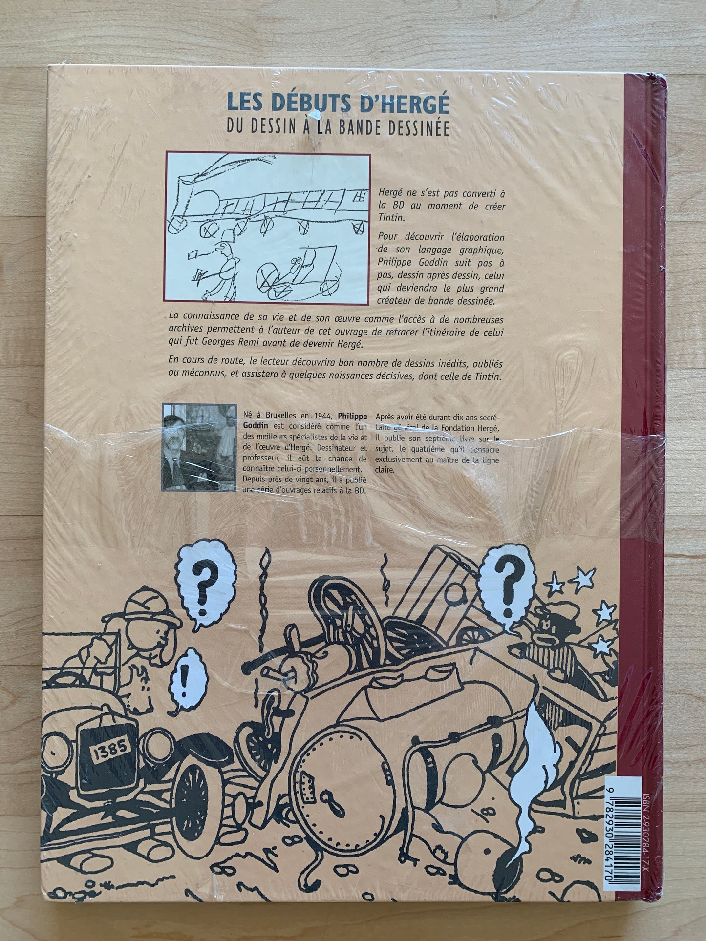 Book cover of "Les Debuts D'Herge" showcasing Hergé's early drawings and comic art development, with Tintin-style illustrations