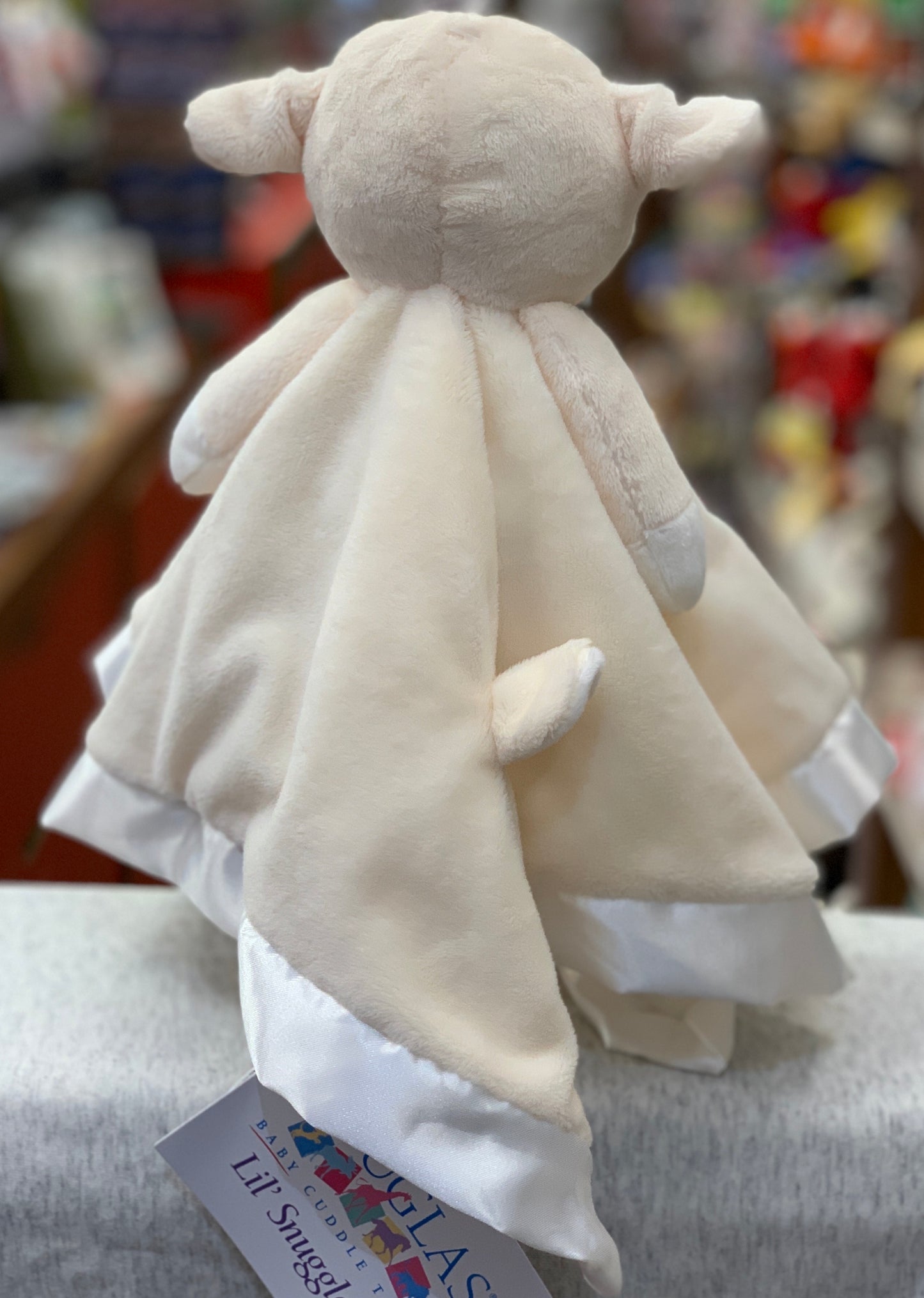 Soft ivory Douglas Baby Lamb plush toy with satin trim, perfect for soothing and cuddling newborns and infants