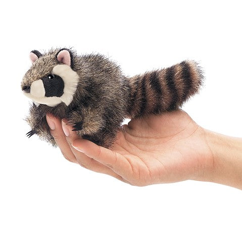 Folkmanis mini raccoon finger puppet held in hand, showing furry details and striped tail