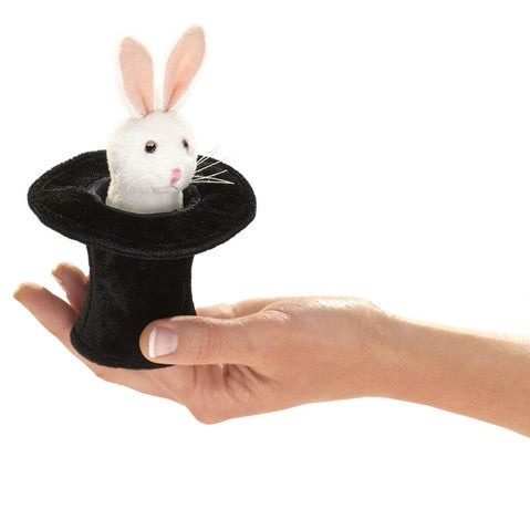 Mini rabbit finger puppet emerging from black magician's hat, held in hand for interactive play
