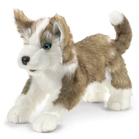 Cuddly Folkmanis Wolf Pup puppet with soft brown and white fur, blue eyes, and movable muzzle