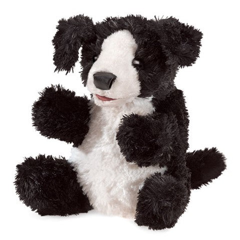 Folkmanis small dog hand puppet with soft black and white fur, movable mouth and legs, perfect for portable play