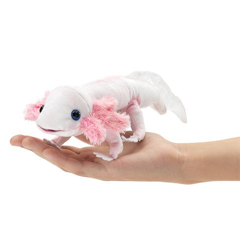 Cute white and pink axolotl finger puppet with feathery gills resting on open palm, showcasing movable features